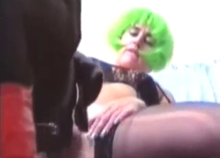 Girl in a sexy wig fucks a black beast today